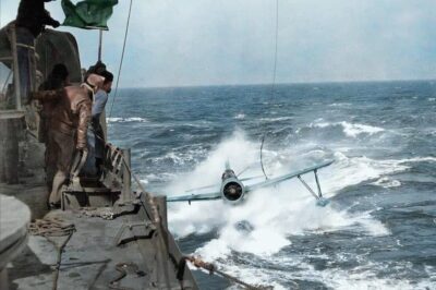 Rare Wartime Moment Captured: South Dakota Battleship Executes Daring Vought OS2U Kingfisher Seaplane Recovery Amidst 1943 Tensions—How Did Crews Pull Off Such a Dangerous Maneuver, and What Secret Missions Did These Planes Undertake?