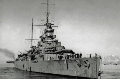 HMS Effingham (D98) British Royal Navy Hawkins-class heavy cruiser at anchor in a Norwegian Fjord, May 16 1940.