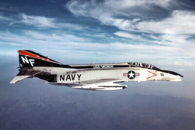 From Warrior to Relic: The Untold Journey of McDonnell F-4N Phantom II (BuNo 151491)—How Did VF-161’s Iconic Fighter Conclude Its Legendary Streak on the USS Midway in 1977, and What Secrets Lurk Behind Its Final Retirement to the Boneyard as 8F0077?