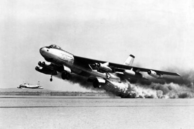 The first American swept-wing aircraft, the Boeing B-47 Stratojet during rocket-assisted take off test, with a Lockheed F-80 as a chase plane.