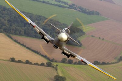 Air-to-air image of a Spitfire from the Royal Air Force (RAF) Battle of Britain Memorial Flight (BBMF), taken over RAF Coningsby in Lincolnshire.