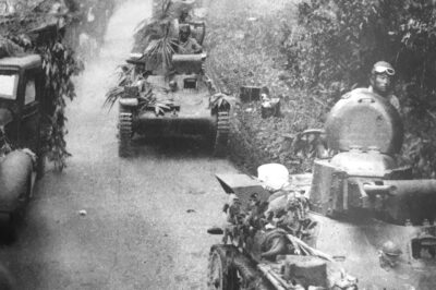 Japanese Type 97 Te-Ke tanks followed by their bicycle infantry behind during the Battle of Kampar in Perak. December 1941