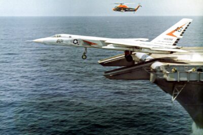 A U.S. Navy A-5A Vigilante of Heavy Attack Squadron VAH-1 “Smoking Tigers” being launched from the USS Saratoga (CVA-60) during operation “Long Horn” in 1964. Note the Kaman UH-25A Seasprite.