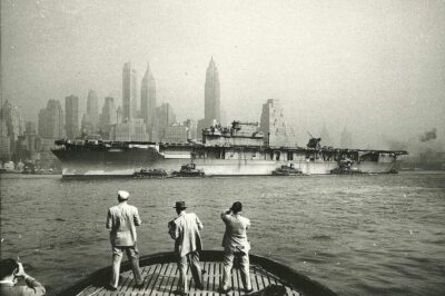 USS Enterprise (CV-6) making her final voyage from the Brooklyn Navy Yard to the scrapper yard in New Jersey, 1958.