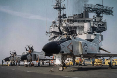 F4H-1 Phantom II aircraft of FS VF-102 “Diamondbacks” spotted on the flight deck of an unidentified Forrestal-class aircraft carrier, 1962. VF-102 was assigned to Carrier Air Group 6 (CVG-6) aboard the newly commissioned aircraft carrier USS Enterprise (CVAN-65).